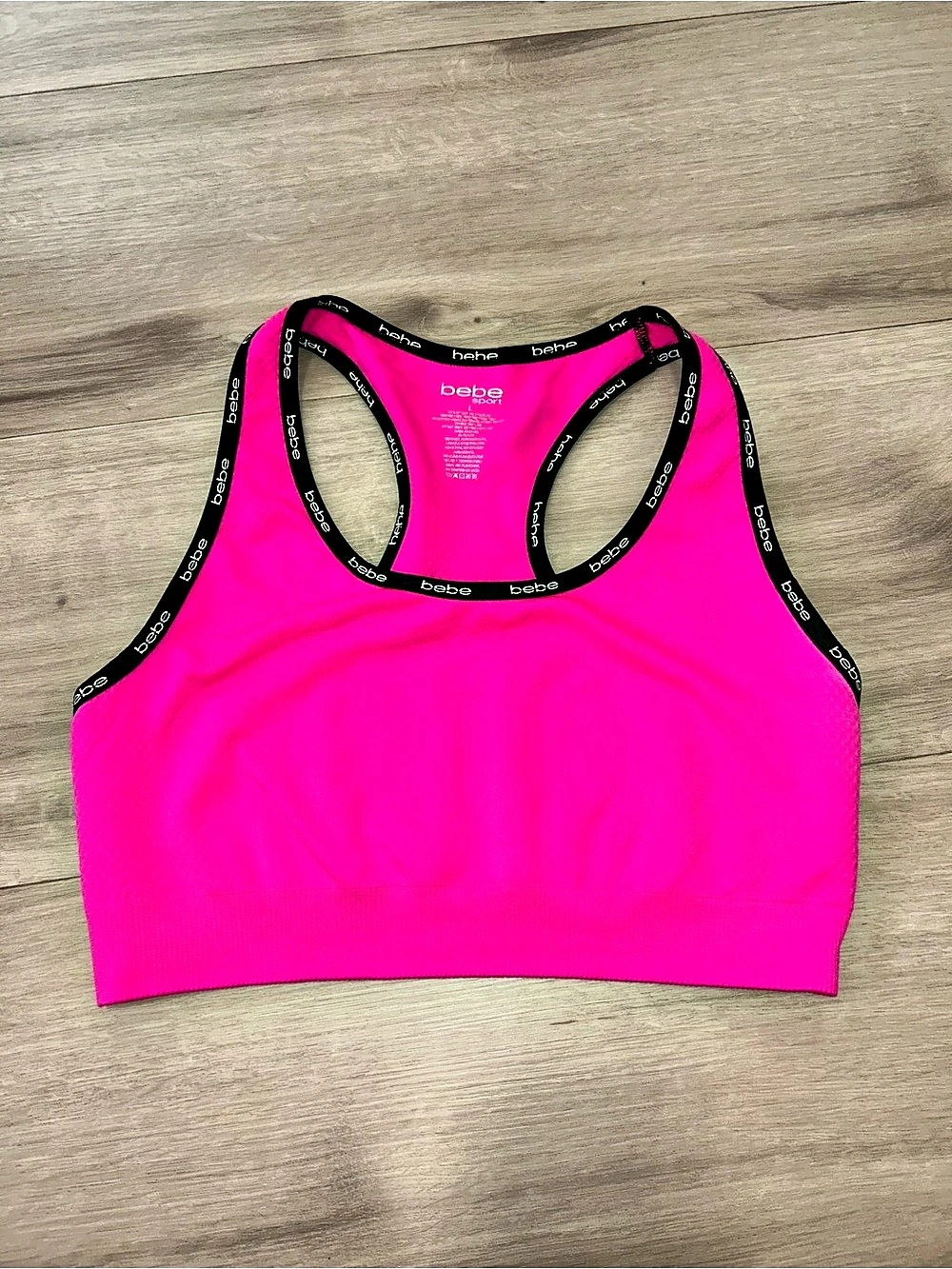 bebe Women's Racerback Tank in Pink Large